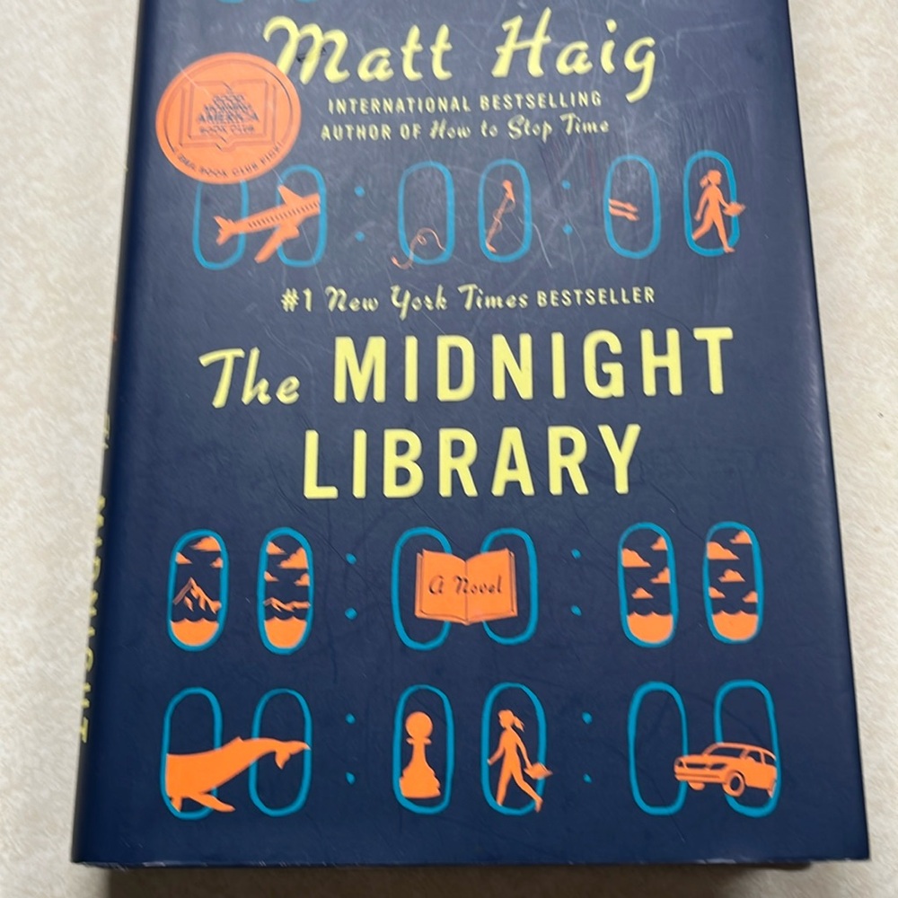 THE MIDNIGHT LIBARY by Matt Haig